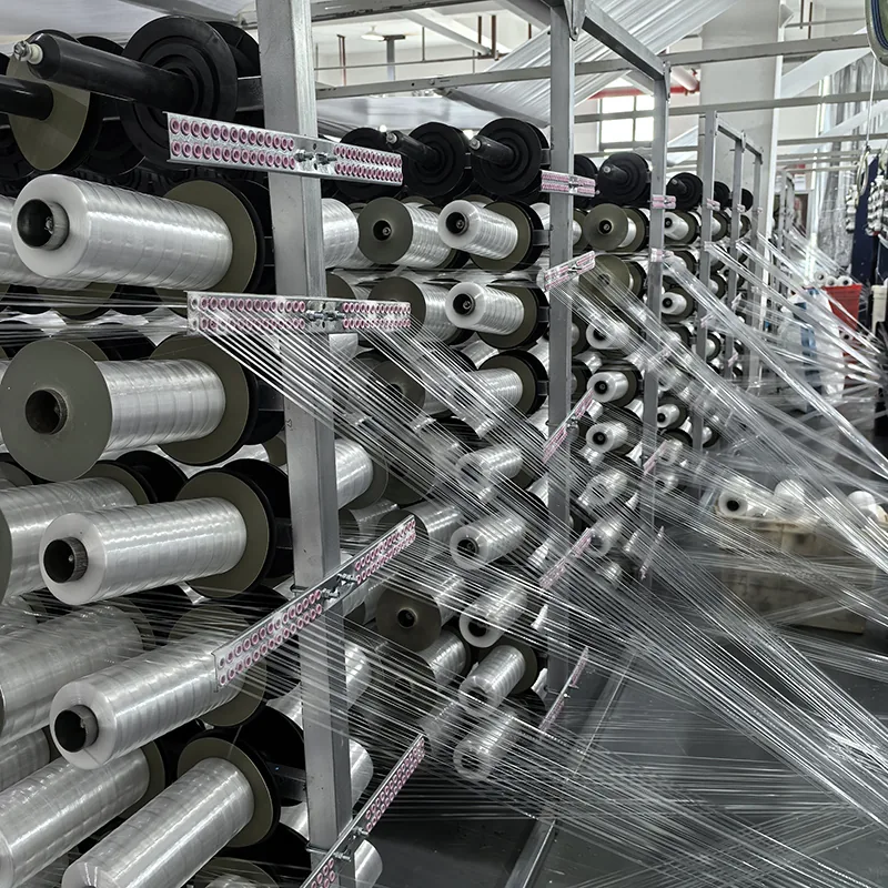 Woven material production preparation reference with multiple yarn rolls
